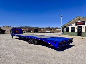 8B93A4B9-635A-4706-8BC8-4011C14FE8AD-300x225 2024 RawMaxx *USED* 102″ x 34′ 12K Single Wheel Flatbed W/ Max Ramps