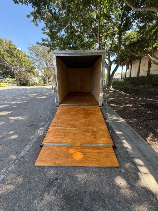 New 2026 Hook & Line 6 x 12 Enclosed 7k Trailer