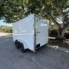 New 2026 Hook & Line 6 x 12 Enclosed 7k Trailer